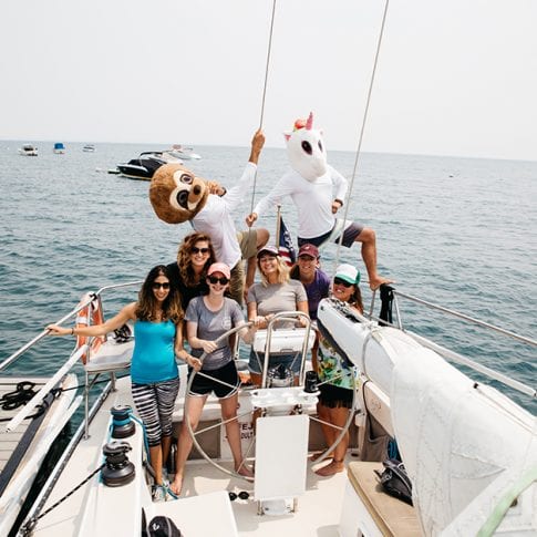 funny group of girls on sailboat