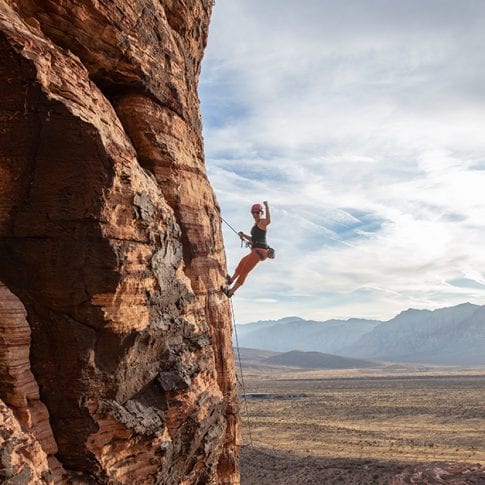 woman climbing at red rocks